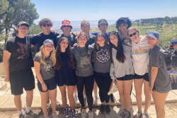Two rows of Students Smiling 